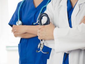 Doctors with stethoscopes in uniform.