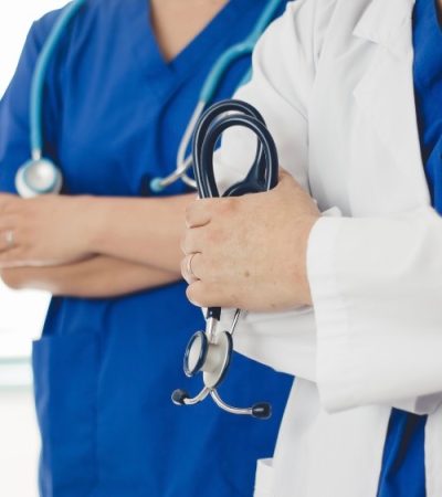Doctors with stethoscopes in uniform.
